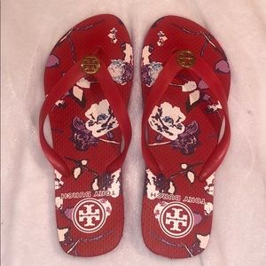 Red floral Tory Burch flip flops